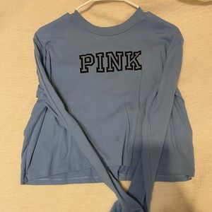 Cropped blue, brand pink shirt!